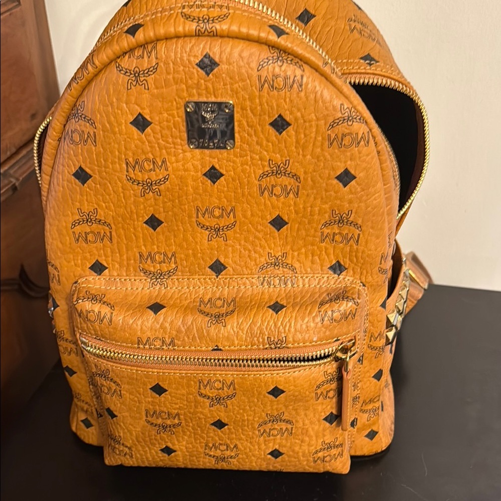 MCM Tan Backpack with Monogram Print and Geometric Studs